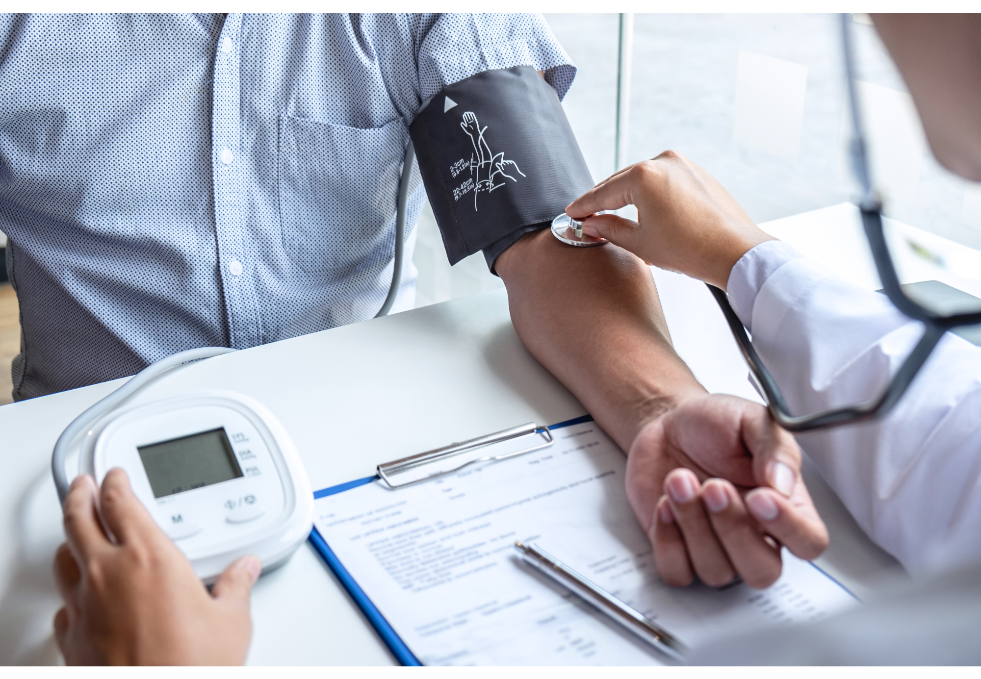 Blood-pressure cuff on a patient’s upper arm.