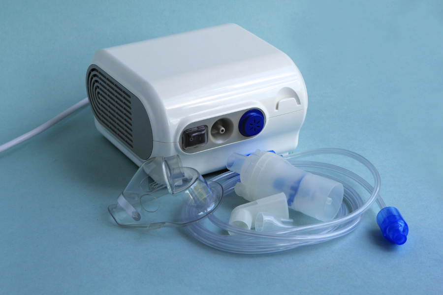 Nebuliser with mask and tubing.
