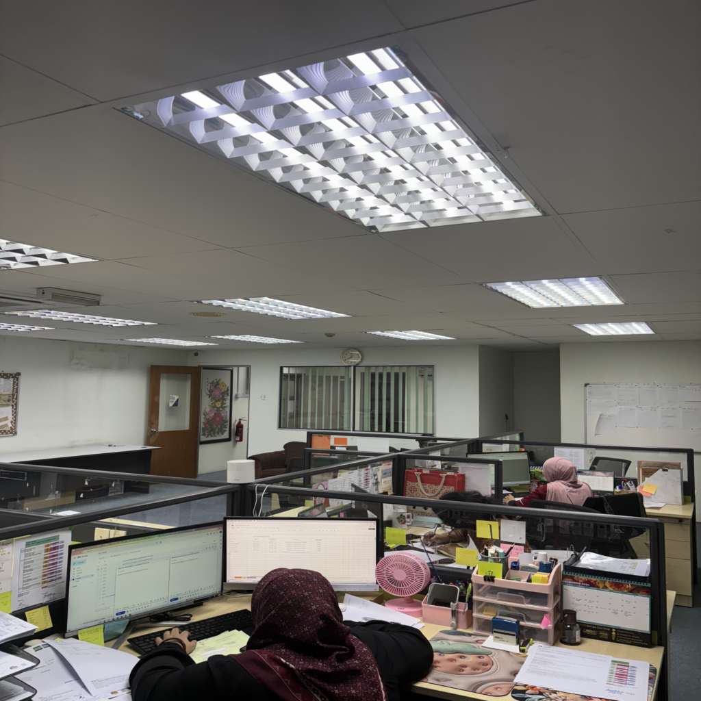 People working at office desks.