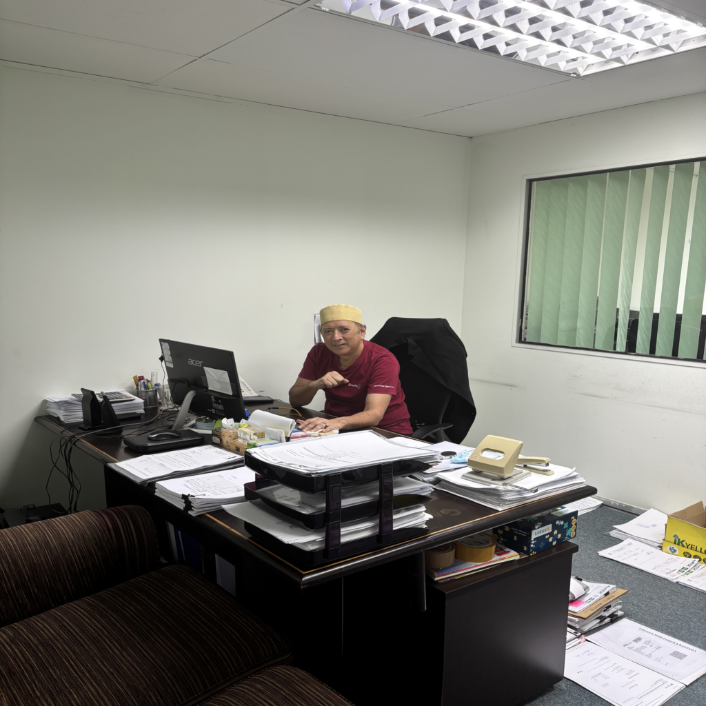 Person working at an office desk.