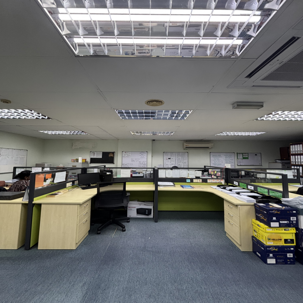 Open-plan office workstations.