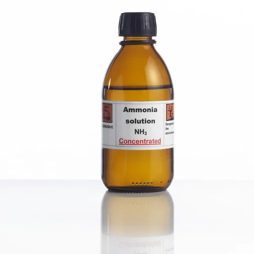 Bottle labeled concentrated ammonia solution with a corrosive warning.